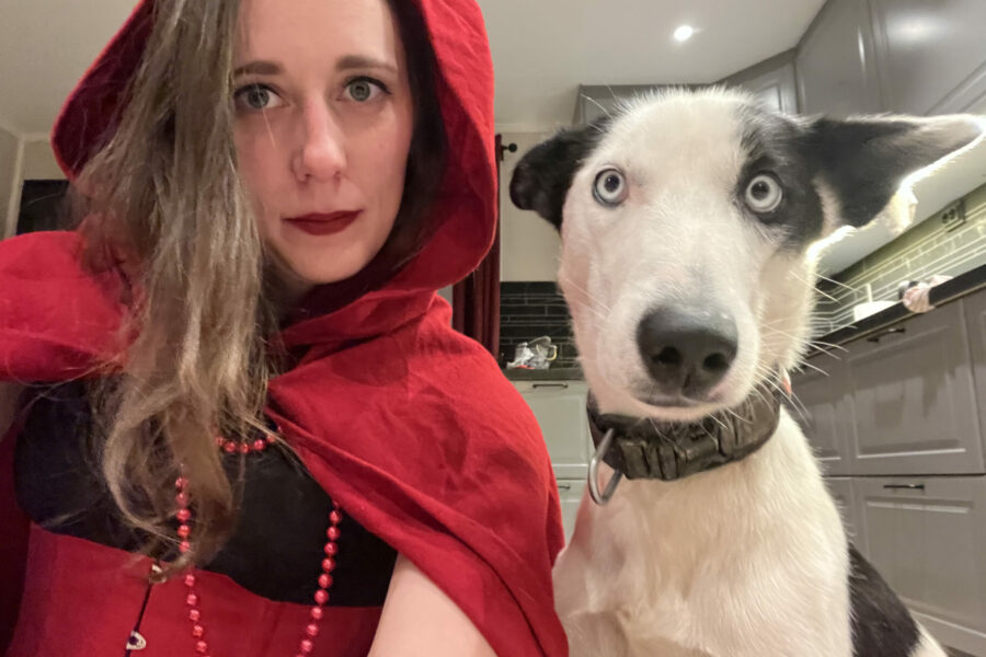 Me dressing up as "Red riding hood". Cassie is the "wolf" and look a bit confused.